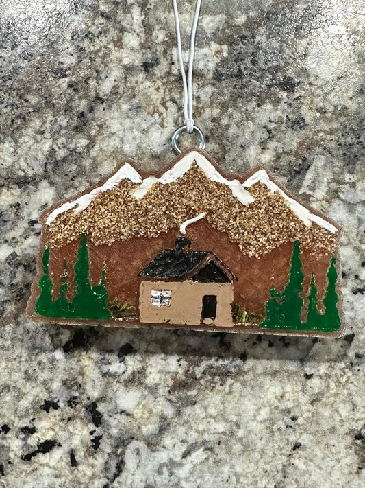 Cabin with trees and mountains